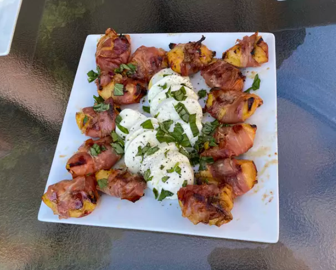 This plate of grilled peaches with burrata is one incredibly delicious example